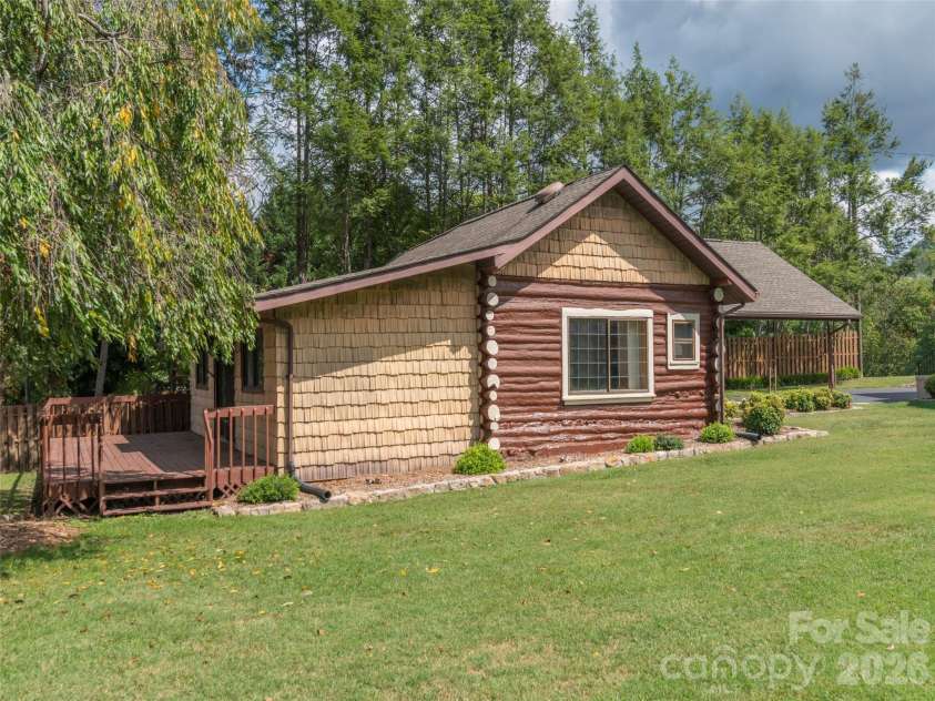 169 Serpentine Avenue, Hot Springs, NC 28743.  MLS# CAR4366060, YatesRealty ID 12734. Cabin and Backyard