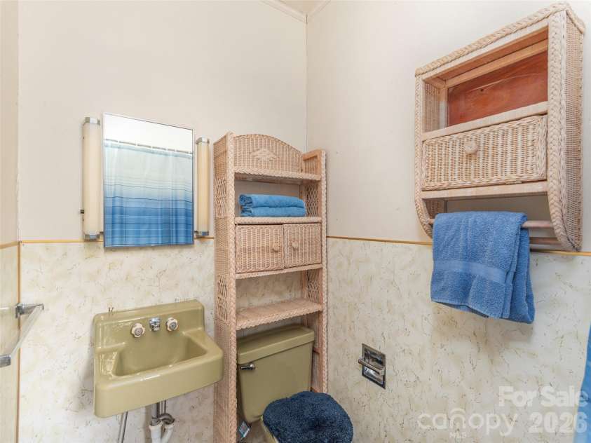 169 Serpentine Avenue, Hot Springs, NC 28743.  MLS# CAR4366060, YatesRealty ID 12734. Cabin Bathroom
