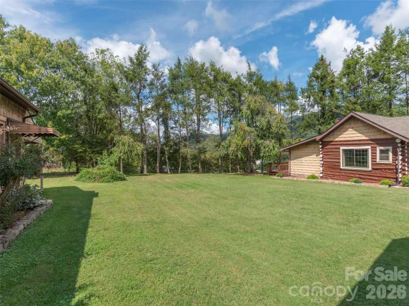169 Serpentine Avenue, Hot Springs, NC 28743.  MLS# CAR4366060, YatesRealty ID 12734. Large Backyard