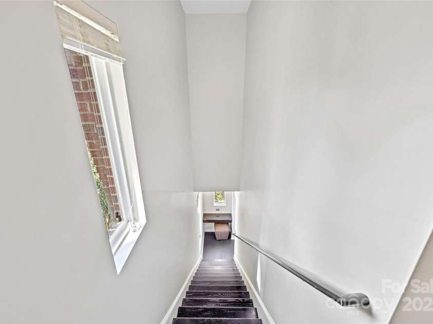 1425 Camden Road, Charlotte, NC 28203.  MLS# CAR4311487, YatesRealty ID 1274. Rear stairs to garage 