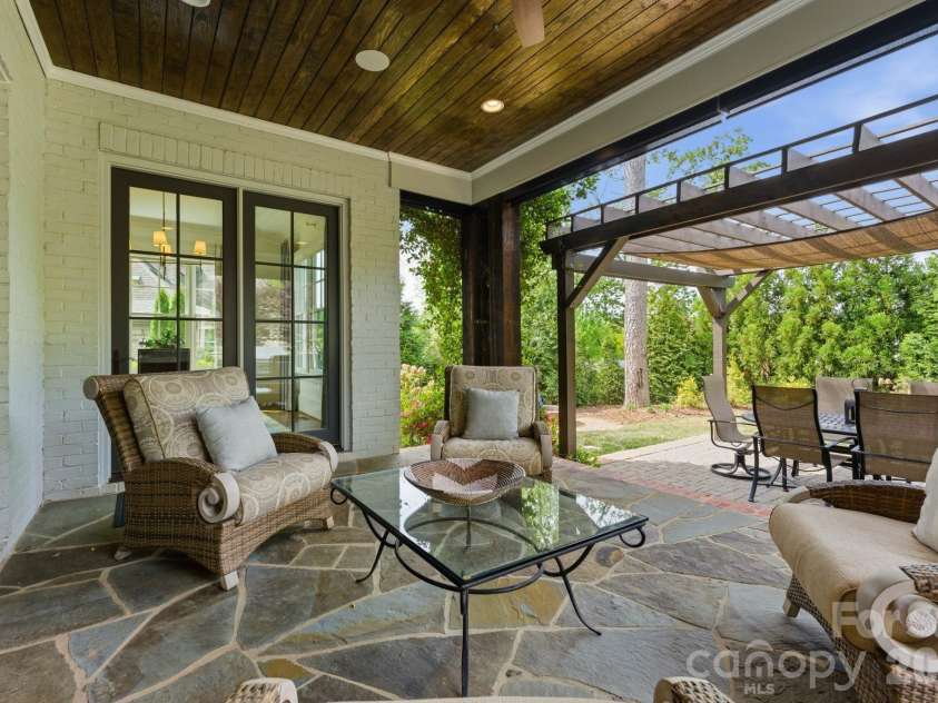 1605 Arborfield Commons Court, Matthews, NC 28105.  MLS# CAR4367073, YatesRealty ID 12740. Covered Patio 