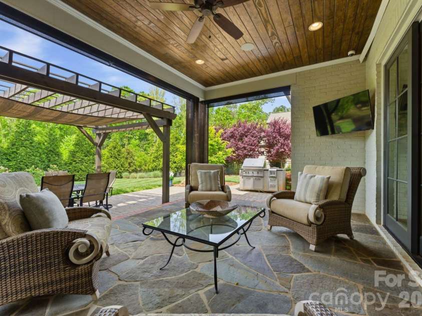1605 Arborfield Commons Court, Matthews, NC 28105.  MLS# CAR4367073, YatesRealty ID 12740. Covered Patio 
