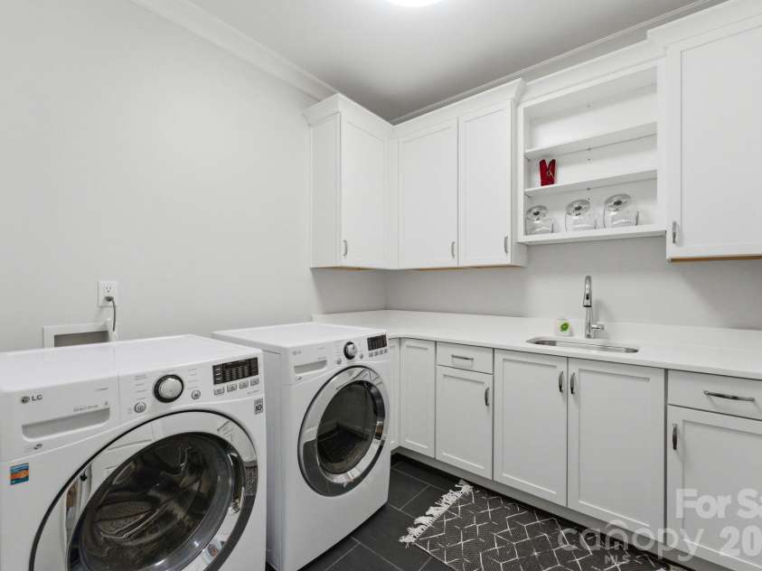 1605 Arborfield Commons Court, Matthews, NC 28105.  MLS# CAR4367073, YatesRealty ID 12740. Laundry Room 