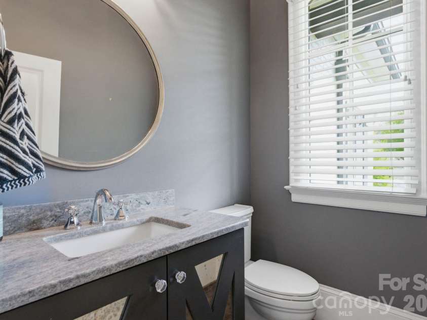 1605 Arborfield Commons Court, Matthews, NC 28105.  MLS# CAR4367073, YatesRealty ID 12740. Powder Room 