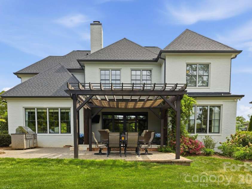 1605 Arborfield Commons Court, Matthews, NC 28105.  MLS# CAR4367073, YatesRealty ID 12740. Rear Exterior