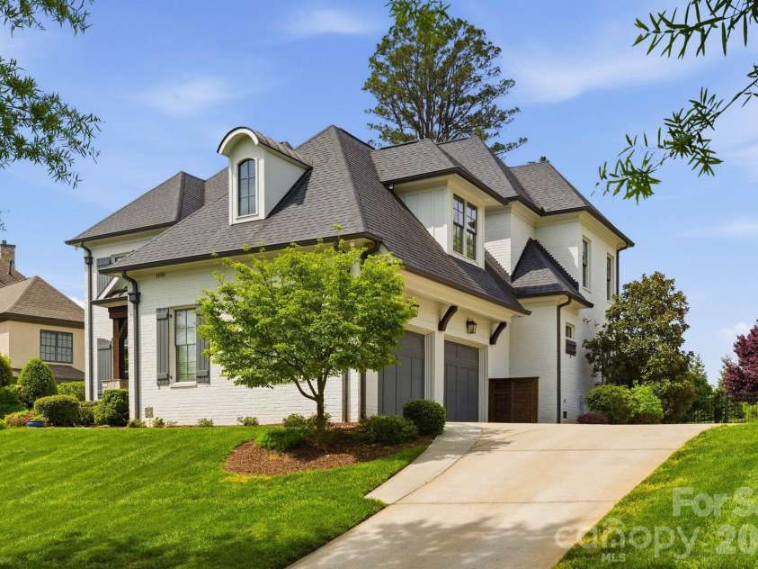 1605 Arborfield Commons Court, Matthews, NC 28105.  MLS# CAR4367073, YatesRealty ID 12740. Side Exterior 