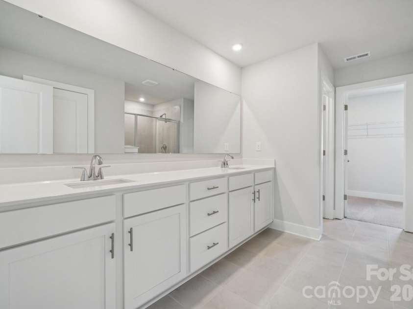 21064 Running Creek Drive, Locust, NC 28097.  MLS# CAR4387452, YatesRealty ID 12744. Photo is representative