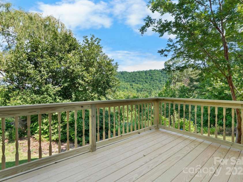 256 Nahum Road, Moravian Falls, NC 28654.  MLS# CAR4275145, YatesRealty ID 1275. PRIMARY SUITE PRIVATE DECK 