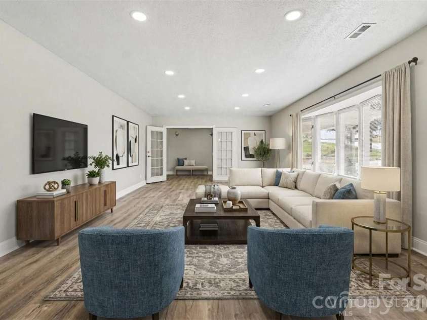 2617 Shady Lane Avenue, Concord, NC 28027.  MLS# CAR4369396, YatesRealty ID 12751. Main level living room 
