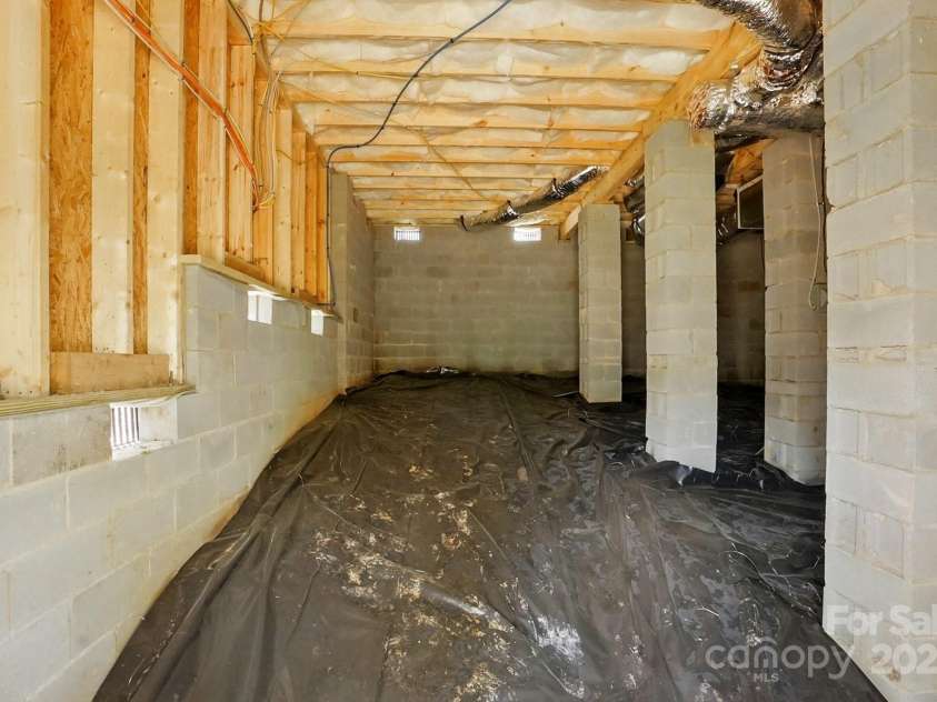 74 Snyder Court, Concord, NC 28025.  MLS# CAR4245224, YatesRealty ID 12753. Large Crawl Space with up to 10'+ Ceilings. Perfect for Storage!...