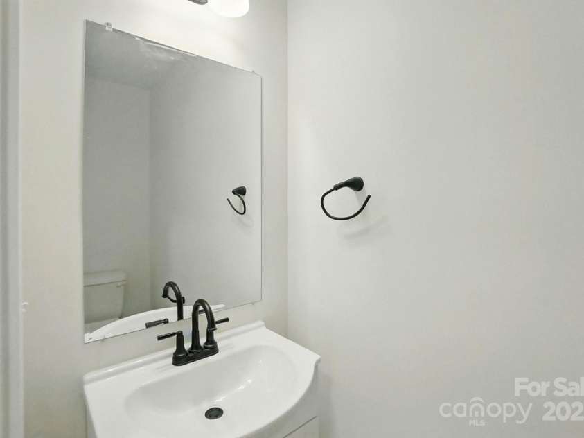 74 Snyder Court, Concord, NC 28025.  MLS# CAR4245224, YatesRealty ID 12753. Powder Room