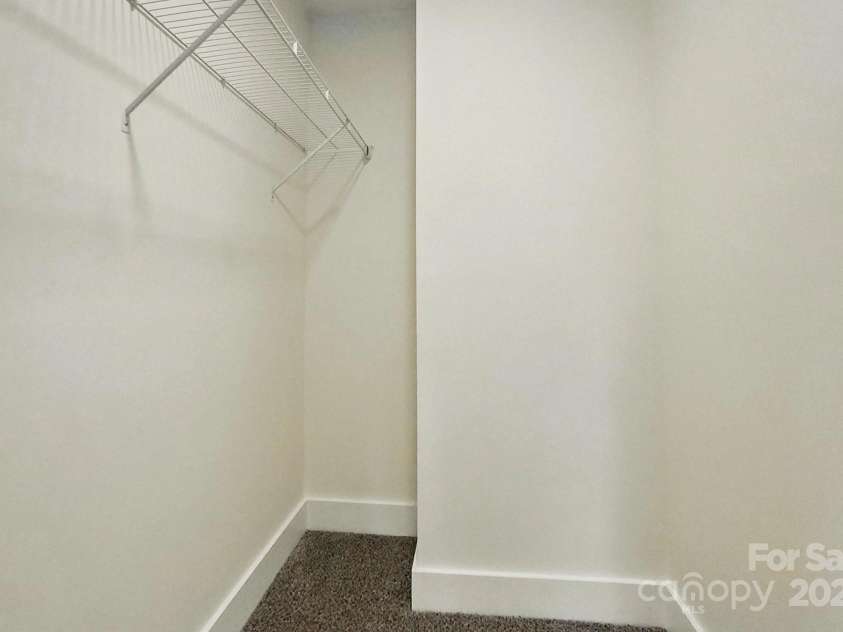 74 Snyder Court, Concord, NC 28025.  MLS# CAR4245224, YatesRealty ID 12753. Primary Bedroom's Walk-in Closet