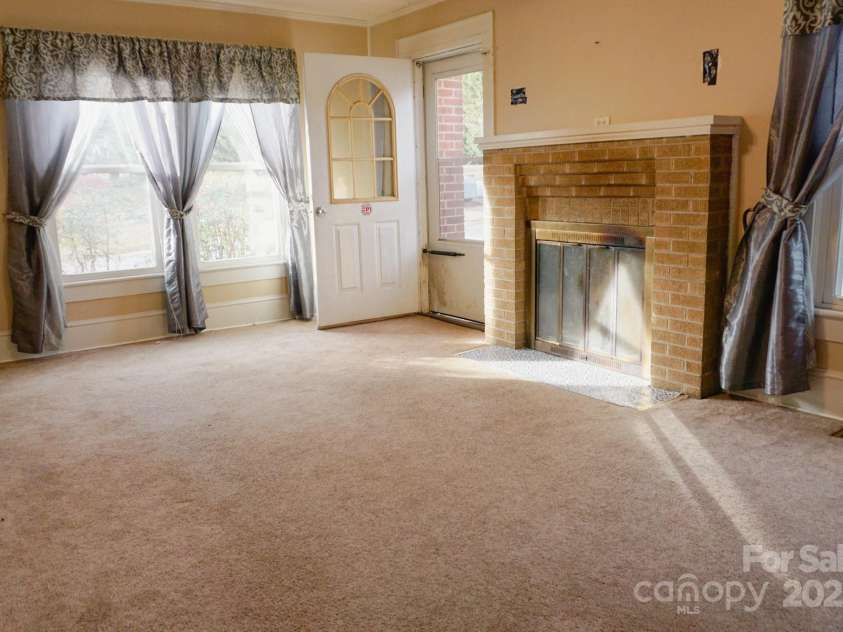 486 Main Street, Forest City, NC 28043.  MLS# CAR4224432, YatesRealty ID 1276. Main living room