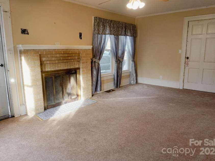 486 Main Street, Forest City, NC 28043.  MLS# CAR4224432, YatesRealty ID 1276. Main living room