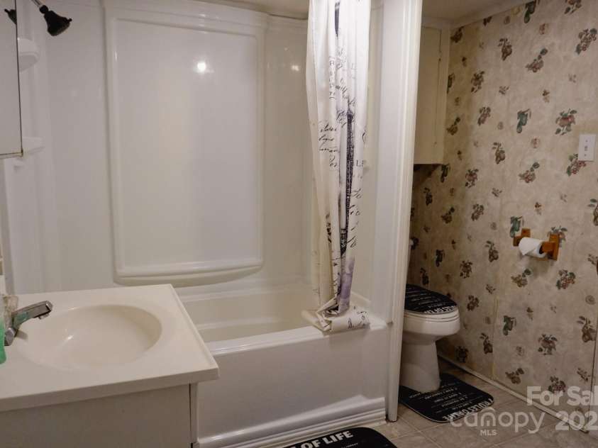 486 Main Street, Forest City, NC 28043.  MLS# CAR4224432, YatesRealty ID 1276. Main - primary bathroom
