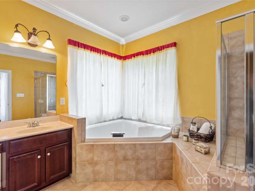 8914 Landsdowne Avenue, Harrisburg, NC 28075.  MLS# CAR4259422, YatesRealty ID 1276. Double vanity with plenty of room for your bathing needs.