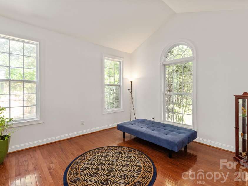 8914 Landsdowne Avenue, Harrisburg, NC 28075.  MLS# CAR4259422, YatesRealty ID 1276. Formal living room with vaulted ceiling.