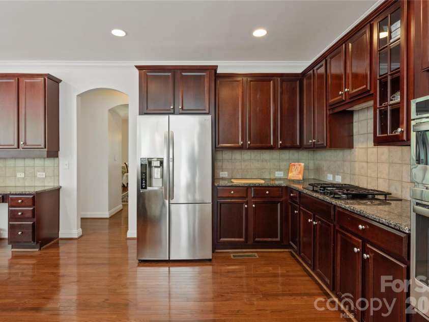 8914 Landsdowne Avenue, Harrisburg, NC 28075.  MLS# CAR4259422, YatesRealty ID 1276. Kitchen overlooking the dining room.