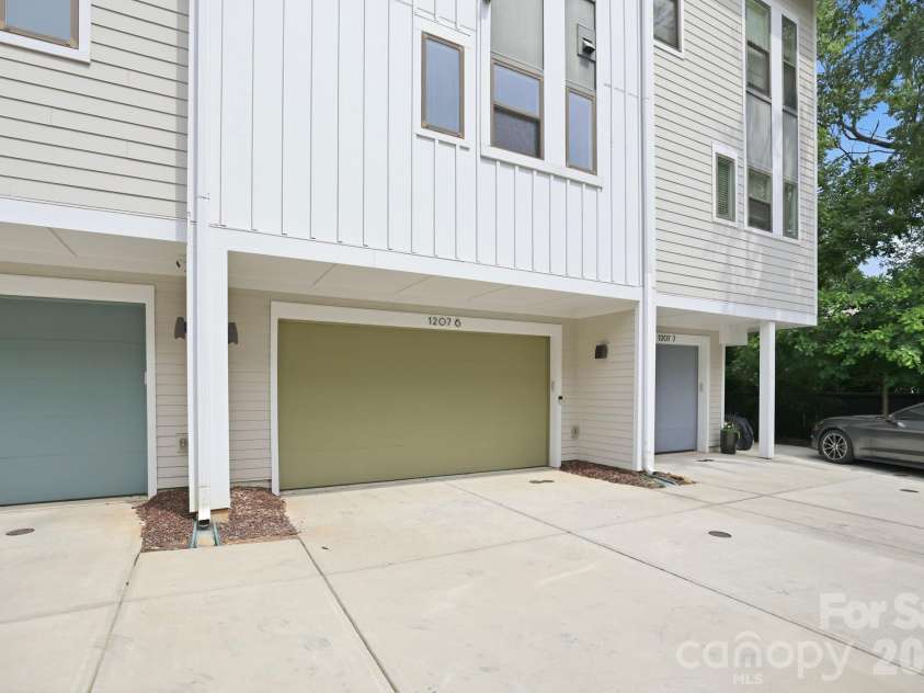 1207 36th Street, Charlotte, NC 28205.  MLS# CAR4398138, YatesRealty ID 12760. Exterior back, garage parking
