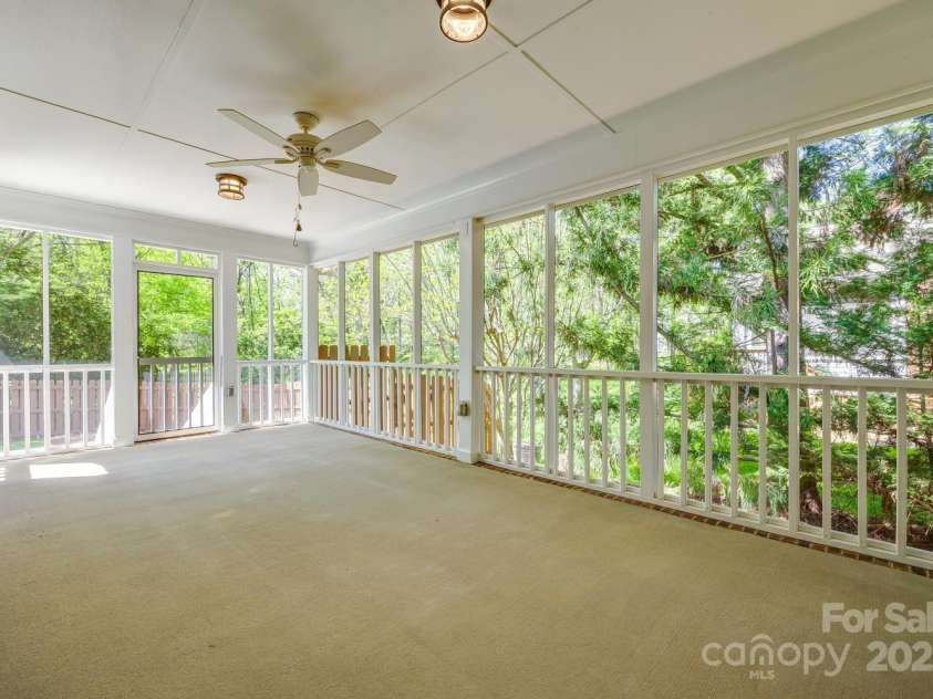 4340 Sequoia Red Lane, Charlotte, NC 28226.  MLS# CAR4233979, YatesRealty ID 12760. Covered screened in porch right side of house