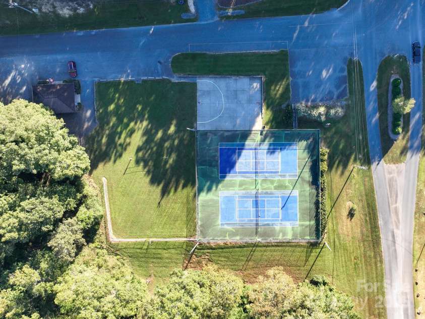 528 Manchester Road, Mount Gilead, NC 27306.  MLS# CAR4241702, YatesRealty ID 12764. Community Tennis/Pickleball & Basketball Court