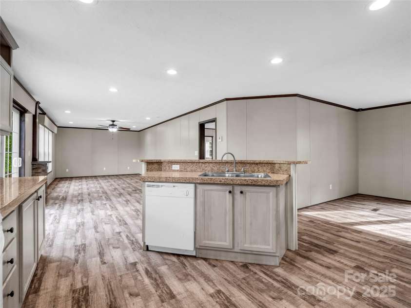 423 Dills Road, Rutherfordton, NC 28139.  MLS# CAR4223716, YatesRealty ID 12765. Kitchen to Family Room