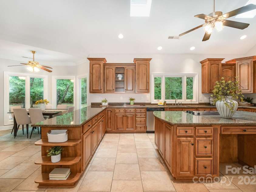 6868 St Peters Lane, Matthews, NC 28105.  MLS# CAR4251557, YatesRealty ID 12768. Chef's Kitchen with oversized island