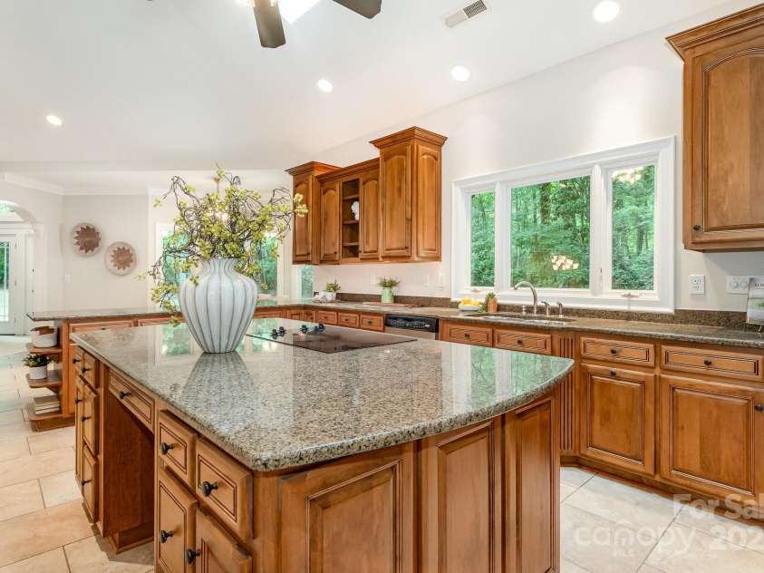 6868 St Peters Lane, Matthews, NC 28105.  MLS# CAR4251557, YatesRealty ID 12768. Chef's Kitchen with oversized island