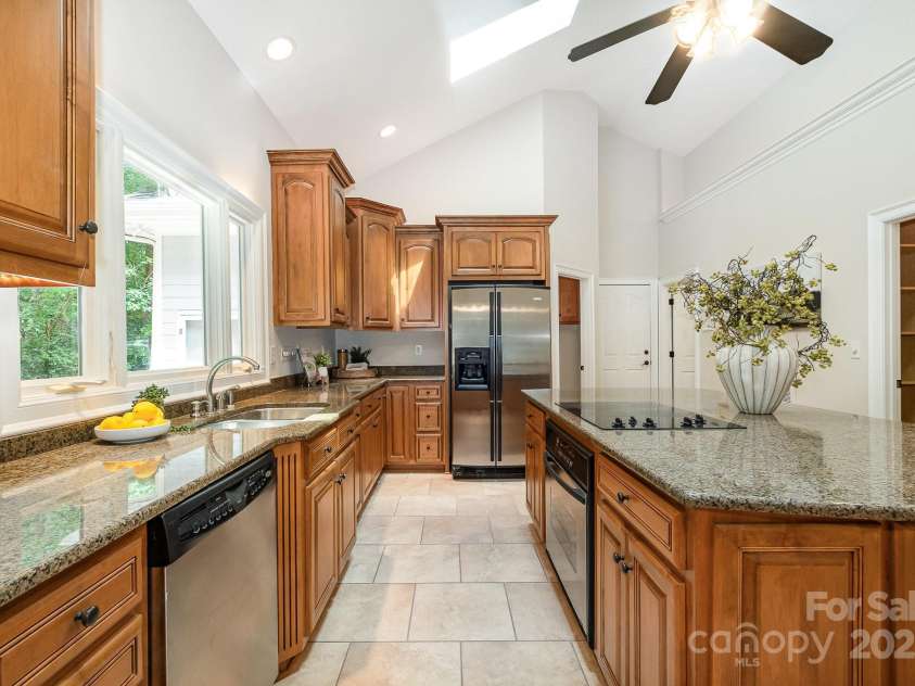 6868 St Peters Lane, Matthews, NC 28105.  MLS# CAR4251557, YatesRealty ID 12768. Chef's Kitchen with oversized island