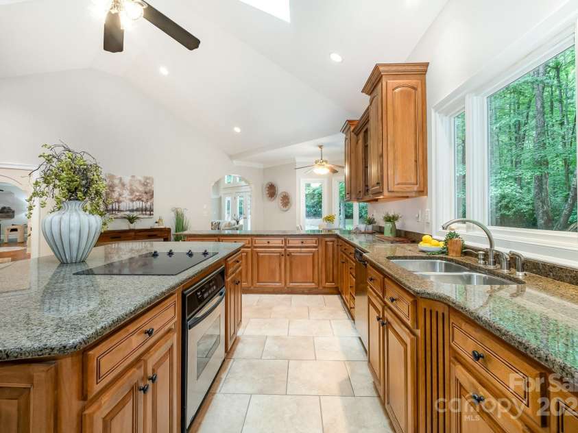6868 St Peters Lane, Matthews, NC 28105.  MLS# CAR4251557, YatesRealty ID 12768. Chef's Kitchen with oversized island