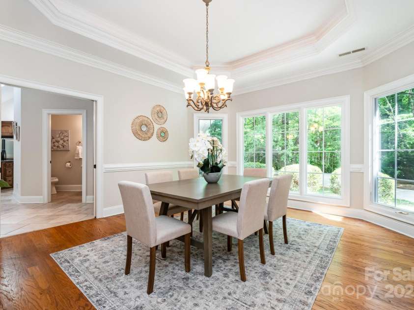 6868 St Peters Lane, Matthews, NC 28105.  MLS# CAR4251557, YatesRealty ID 12768. Formal dining room.