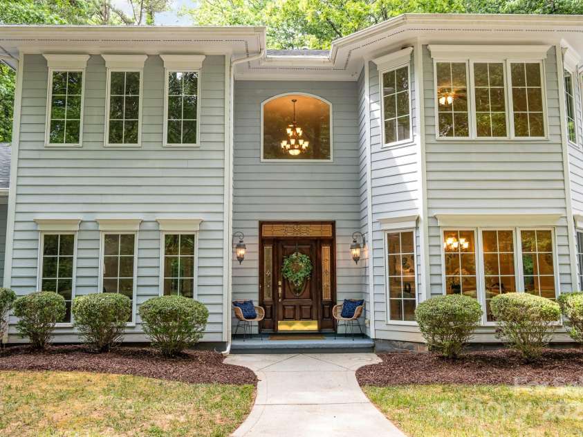 6868 St Peters Lane, Matthews, NC 28105.  MLS# CAR4251557, YatesRealty ID 12768. Front of home