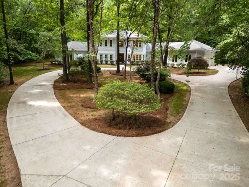 6868 St Peters Lane, Matthews, NC 28105.  MLS# CAR4251557, YatesRealty ID 12768. Gated circular driveway