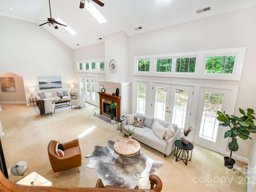 6868 St Peters Lane, Matthews, NC 28105.  MLS# CAR4251557, YatesRealty ID 12768. Two story great room