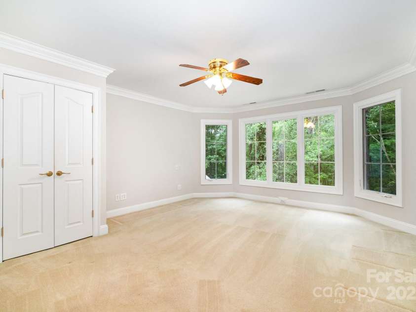 6868 St Peters Lane, Matthews, NC 28105.  MLS# CAR4251557, YatesRealty ID 12768. Upstairs secondary bedroom