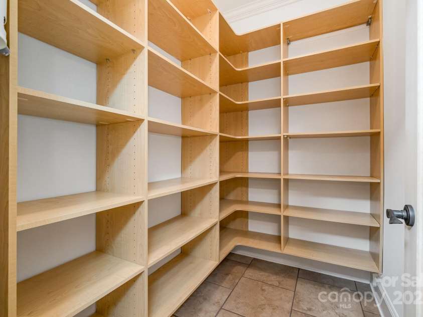 6868 St Peters Lane, Matthews, NC 28105.  MLS# CAR4251557, YatesRealty ID 12768. Walk in pantry