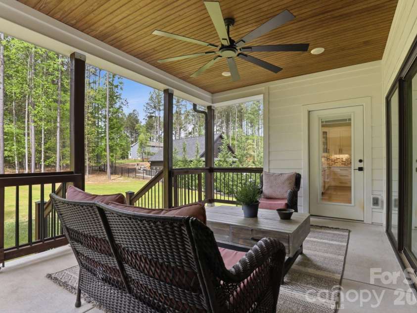 420 Stillwater Road, Troutman, NC 28166.  MLS# CAR4368989, YatesRealty ID 12771. Back Covered Deck