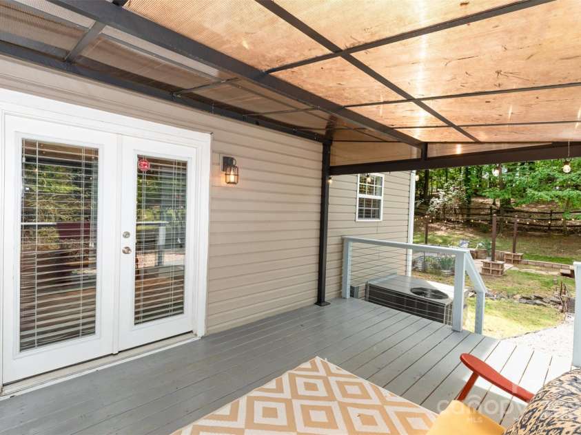 3004 Point Clear Drive, Tega Cay, SC 29708.  MLS# CAR4249209, YatesRealty ID 12772. Deck with pergola