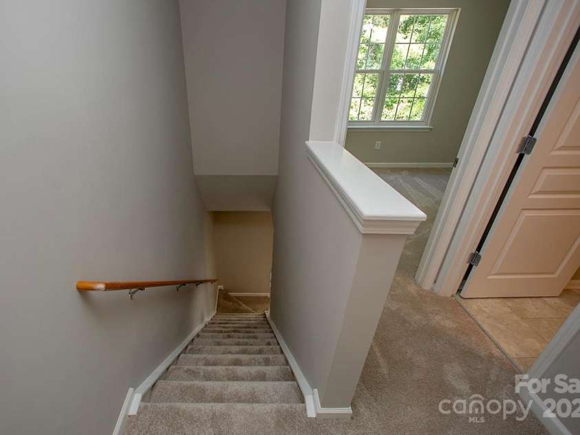 4938 Sunset Ridge Court, Charlotte, NC 28269.  MLS# CAR4256008, YatesRealty ID 12774. Oh, and there is brand-new carpet throughout the upper level.