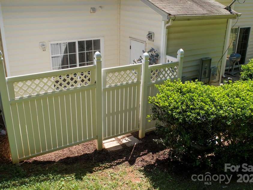 4938 Sunset Ridge Court, Charlotte, NC 28269.  MLS# CAR4256008, YatesRealty ID 12774. You'll love hosting BBQs on your new patio, opening the gate to let the party flow into the common space for cornhole and more games.
