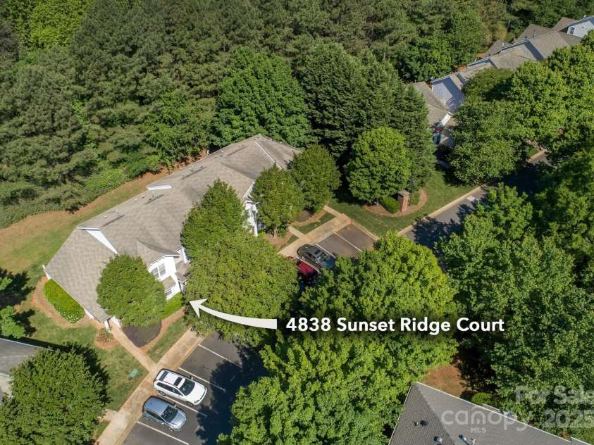 4938 Sunset Ridge Court, Charlotte, NC 28269.  MLS# CAR4256008, YatesRealty ID 12774. You'll love the mature landscape all around your new home.