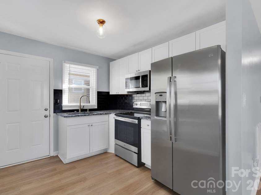 2607/2609 Celia Avenue, Charlotte, NC 28216.  MLS# CAR4336949, YatesRealty ID 12778. 
