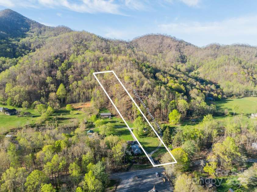 15 Curly Willow Lane, Weaverville, NC 28787.  MLS# CAR4246546, YatesRealty ID 12781. 1.76 acres from front of property