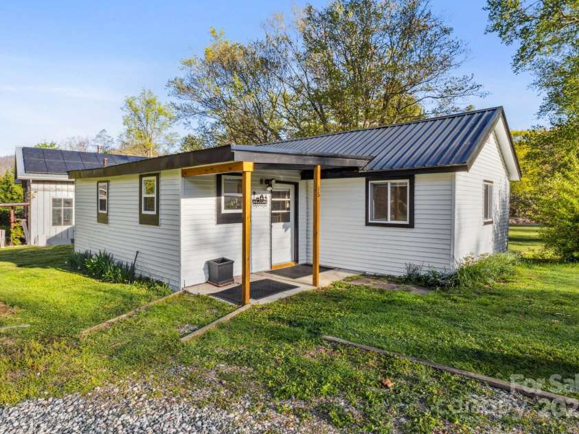 15 Curly Willow Lane, Weaverville, NC 28787.  MLS# CAR4246546, YatesRealty ID 12781. Back door from parking area