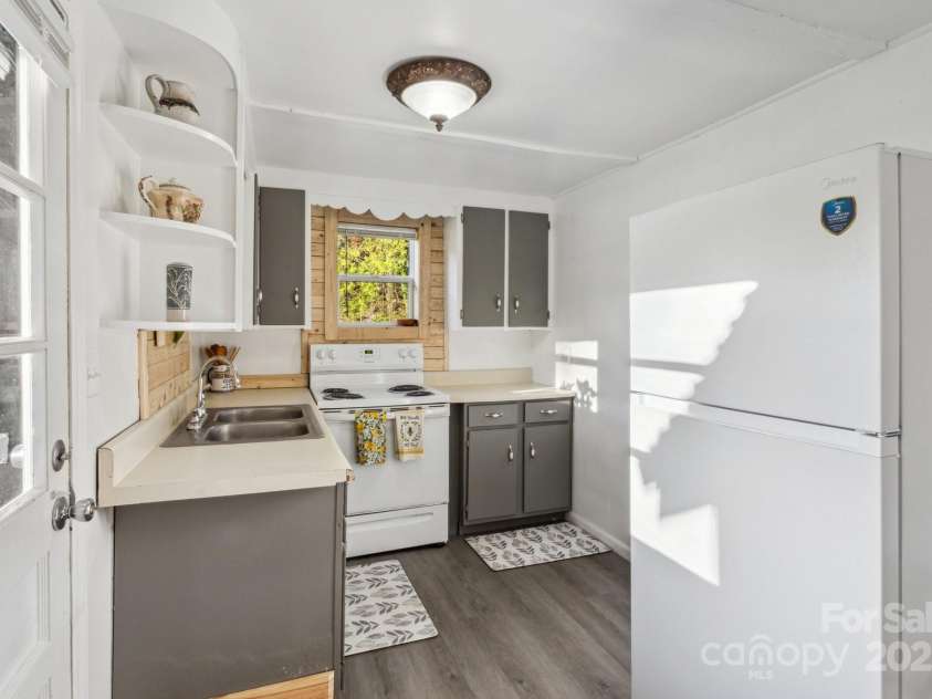 15 Curly Willow Lane, Weaverville, NC 28787.  MLS# CAR4246546, YatesRealty ID 12781. Back door into kitchen
