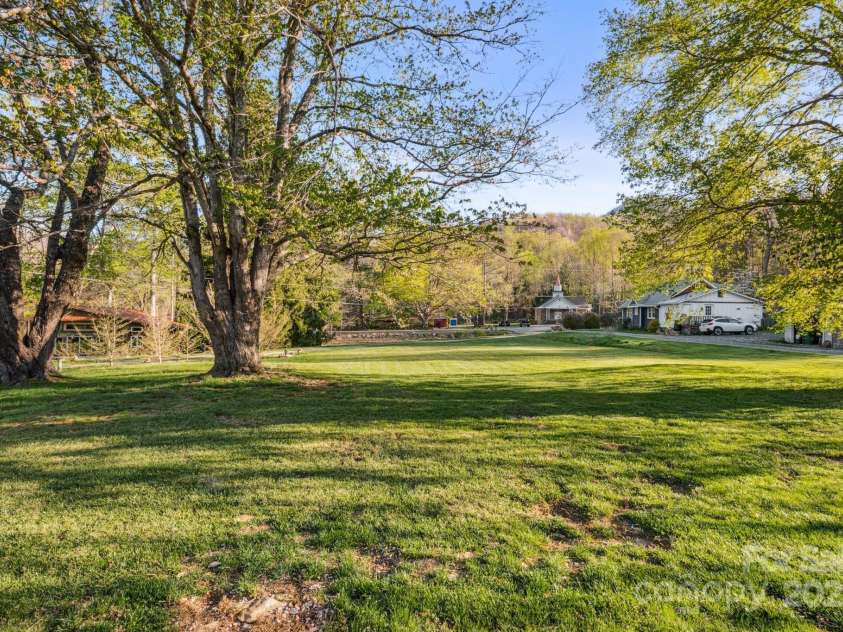 15 Curly Willow Lane, Weaverville, NC 28787.  MLS# CAR4246546, YatesRealty ID 12781. Large, level front yard with mountain views