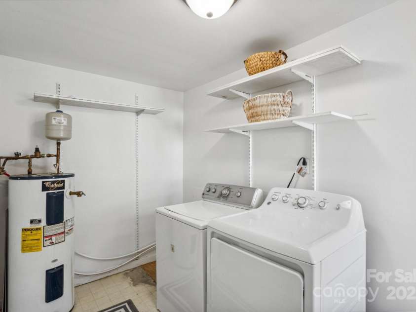 15 Curly Willow Lane, Weaverville, NC 28787.  MLS# CAR4246546, YatesRealty ID 12781. Laundry room