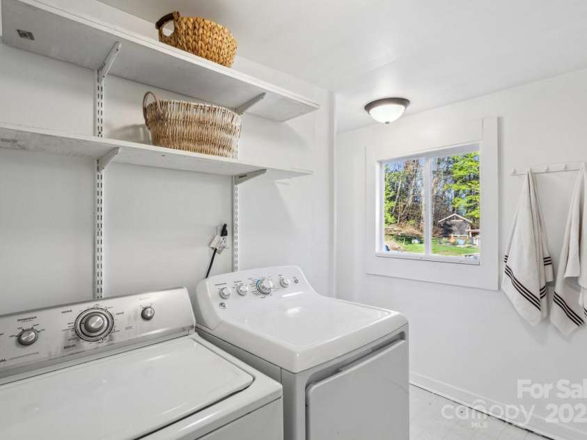 15 Curly Willow Lane, Weaverville, NC 28787.  MLS# CAR4246546, YatesRealty ID 12781. Laundry room with window