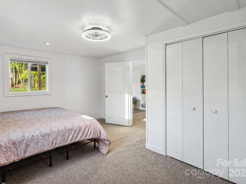 15 Curly Willow Lane, Weaverville, NC 28787.  MLS# CAR4246546, YatesRealty ID 12781. Primary bedroom