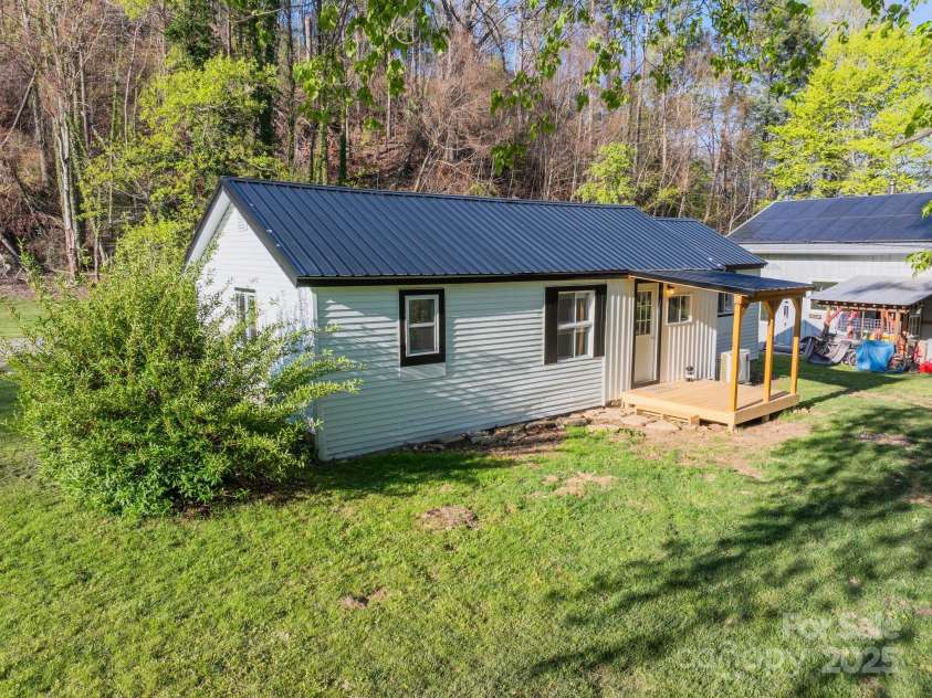 15 Curly Willow Lane, Weaverville, NC 28787.  MLS# CAR4246546, YatesRealty ID 12781. Yellowbell on corner
